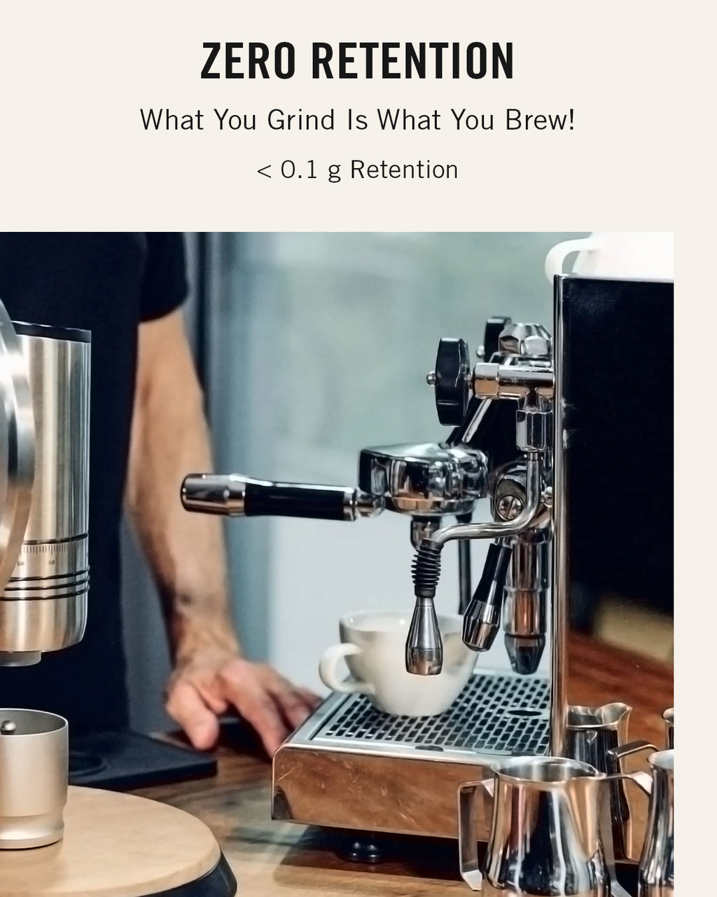 NECCST Series 1 coffee grinder beside an espresso machine, with less than 0.1 g retention