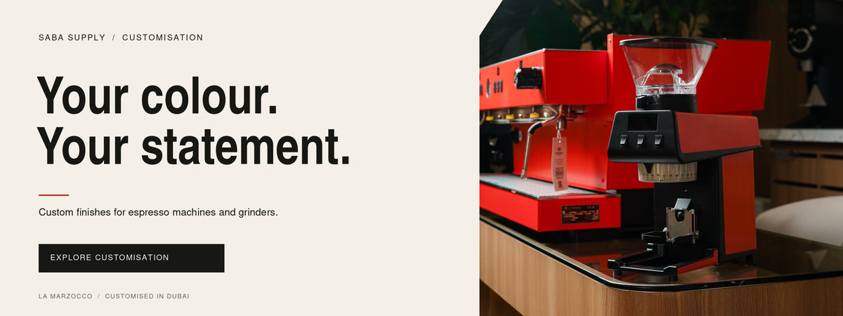 Custom red commercial espresso machine and grinder at Saba Espresso Dubai